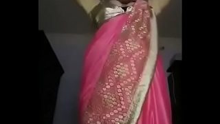 Cute Indian Girl strips while talking dirty with her lover Videos